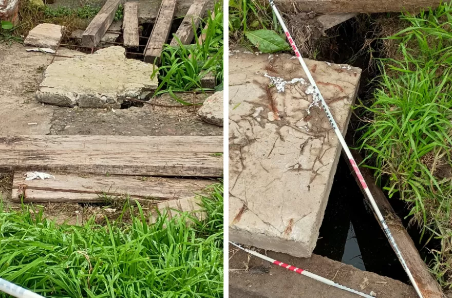Las imágenes remitidas a la redacción muestran tapas de hormigón desplazadas, una zanja abierta con agua en su interior, cintas de peligro y una señalización precaria realizada con maderas. 