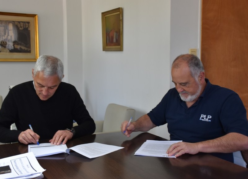 La firma del convenio.